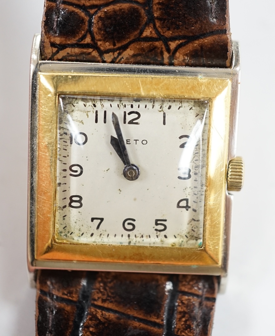 A gentleman's 18ct gold and steel Veto square case manual wind wrist watch, case diameter 26mm, on a leather strap. Condition - poor to fair